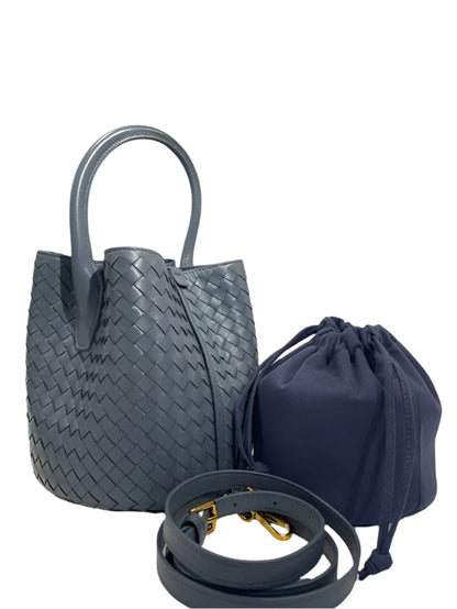 Blue woven handbag with matching drawstring bag and belt 