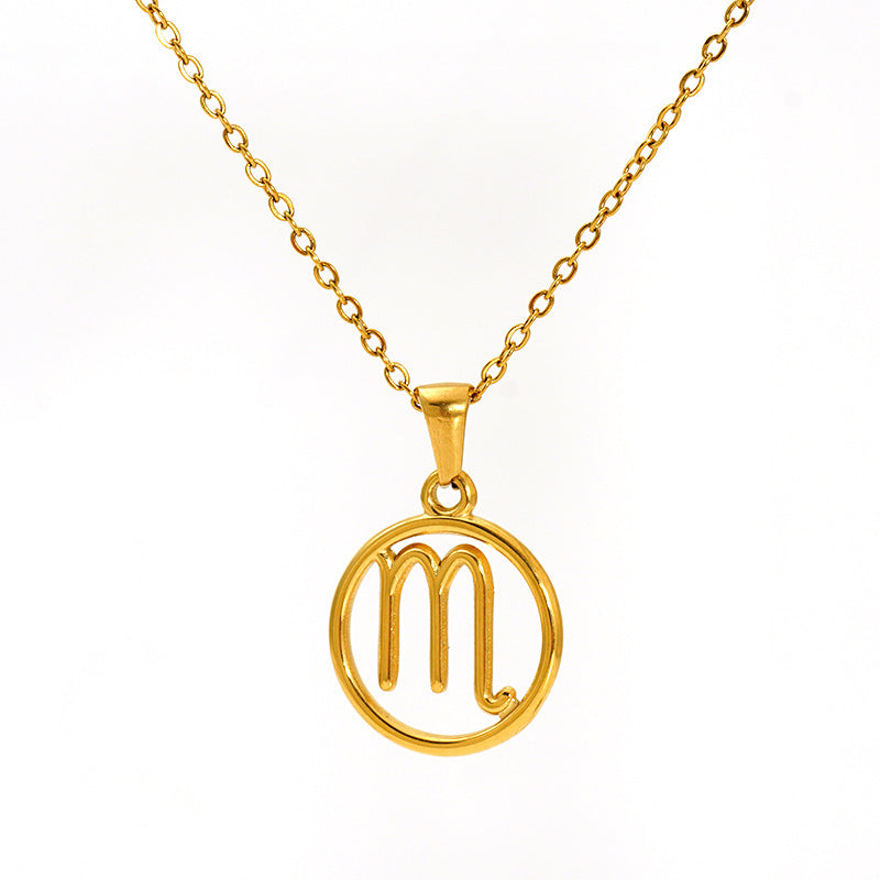 Gold necklace with a 'M' pendant 