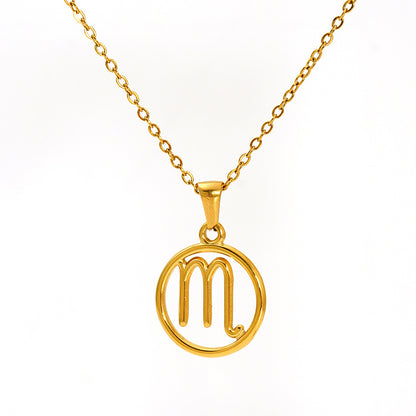 Gold necklace with a 'M' pendant 