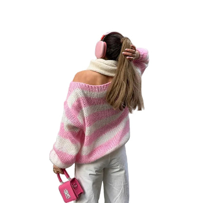 Pink and white striped knit pullover – back view showing loose fit and long sleeve length on model
