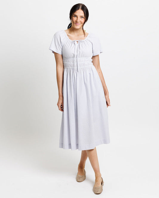 Woman wearing a white dress 