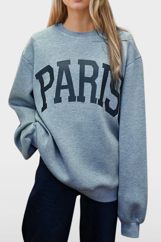 a big sweat shirt with the name paris 