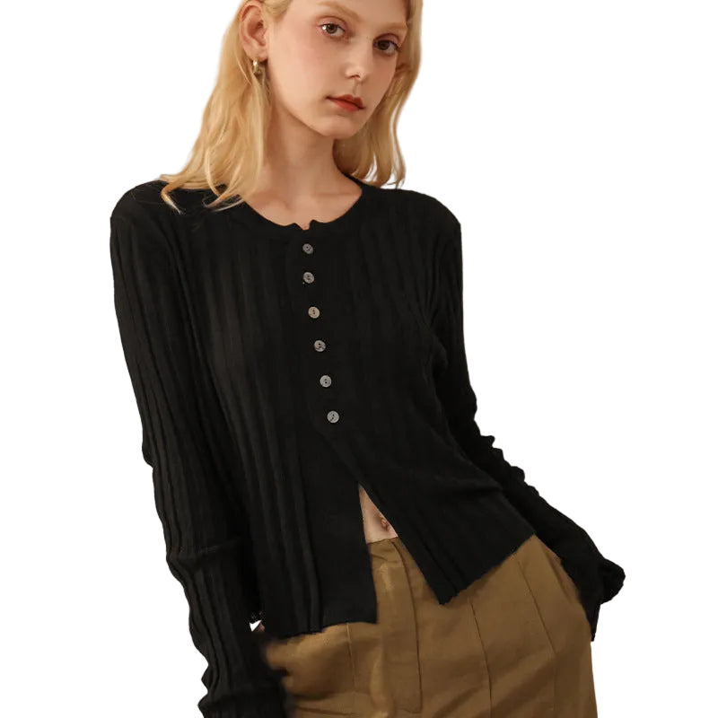 Woman wearing a stylish black cardigan button up 