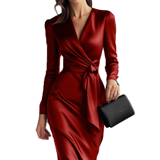 Red satin dress with a black clutch 