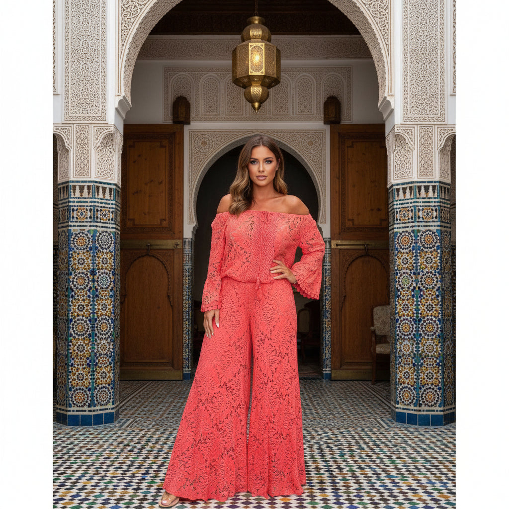 woman wearing a coral lace off-shoulder top and wide-leg pants for night out days 