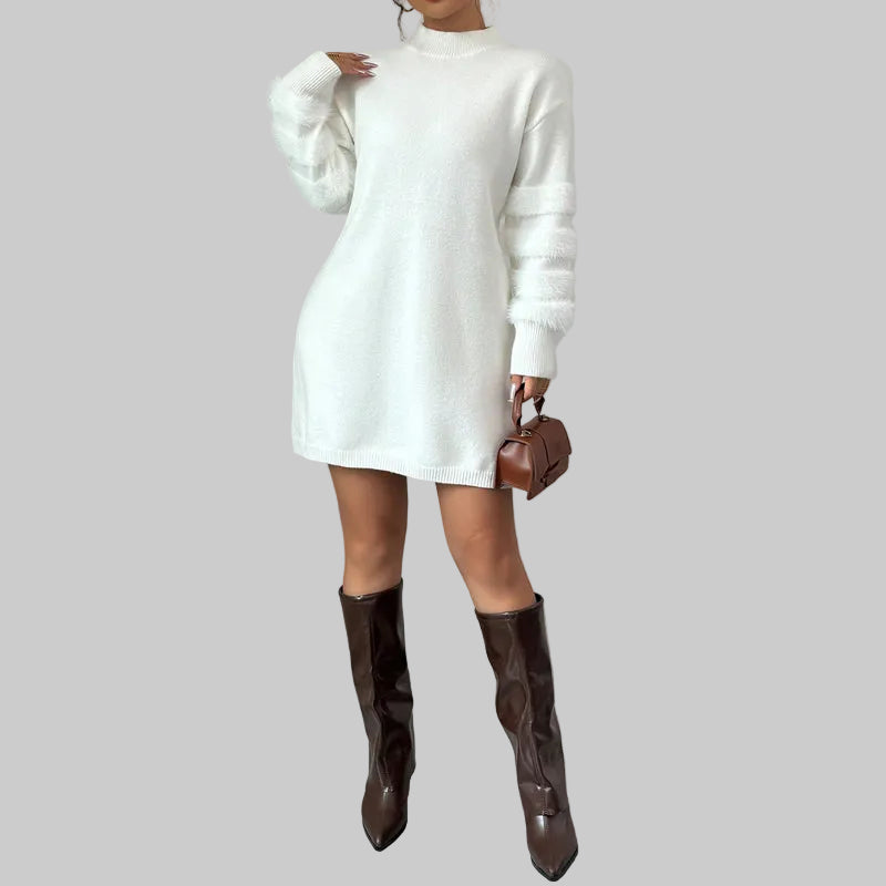 Full length view of faux fur trim mini dress styled with heels

