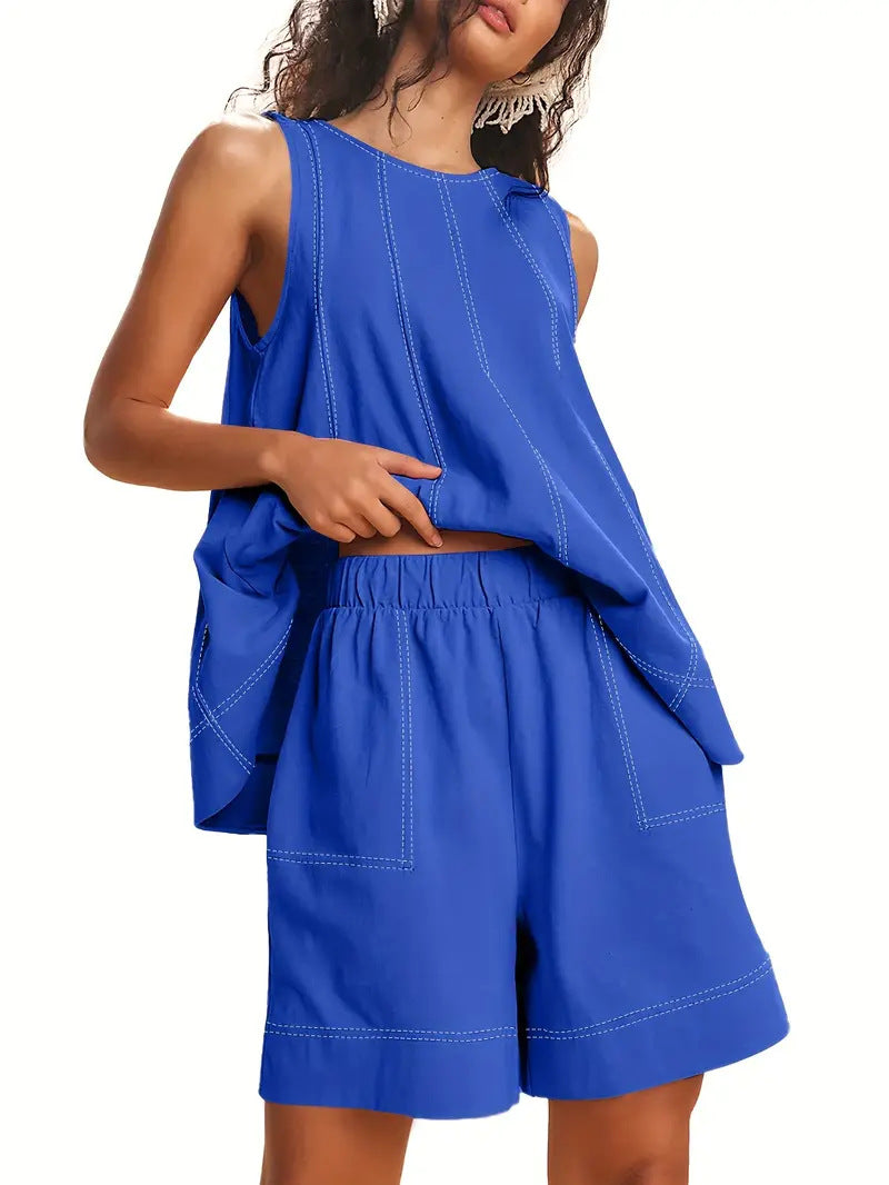 Matching tank and shorts lounge set in blue – side view showing elastic waist and cropped shorts length
