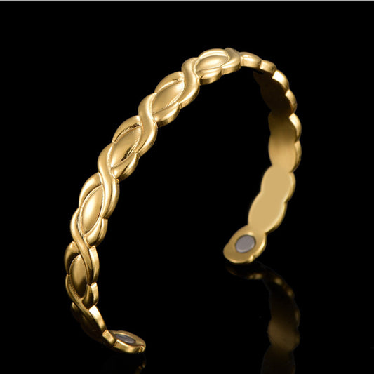 Gold copper magnetic therapy bracelet with geometric infinity design and embedded magnets

