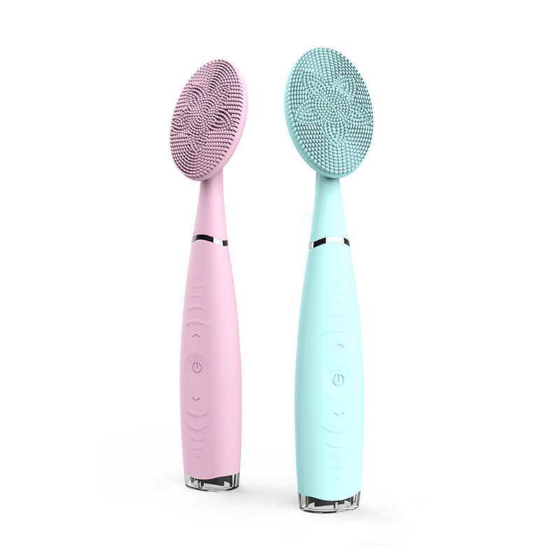 Rechargeable vibrating face brush with LED charging indicator
