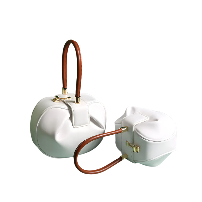 Two white handbags with brown handles 