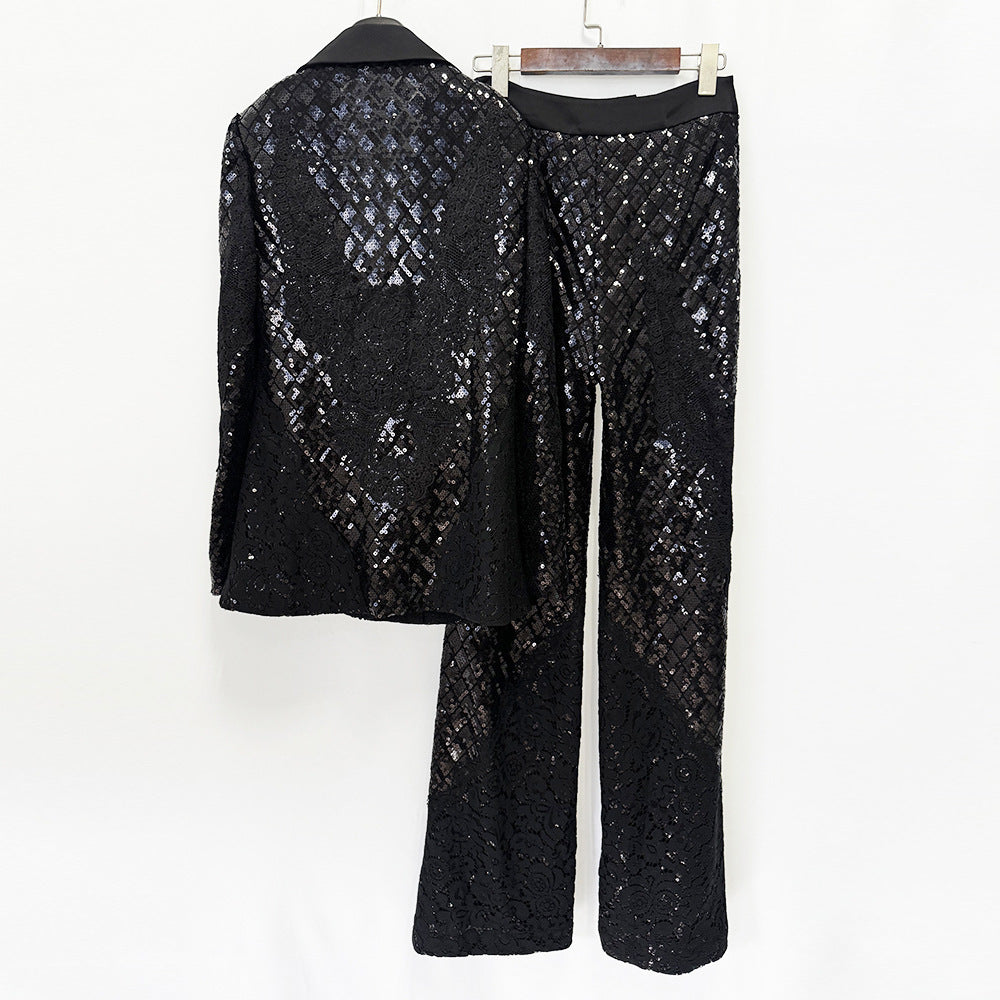 Back view of a black sequin lace blazer and matching wide-leg pants displayed on hangers.
