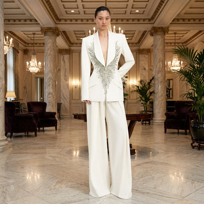 woman wearing a Crystal-Embellished Shawl Collar Blazer & Wide-Leg Trouser Suit Set