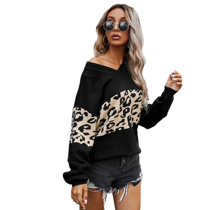 Leopard print V-neck long sleeve pullover top in black  – front view, slim fit knit sweater
