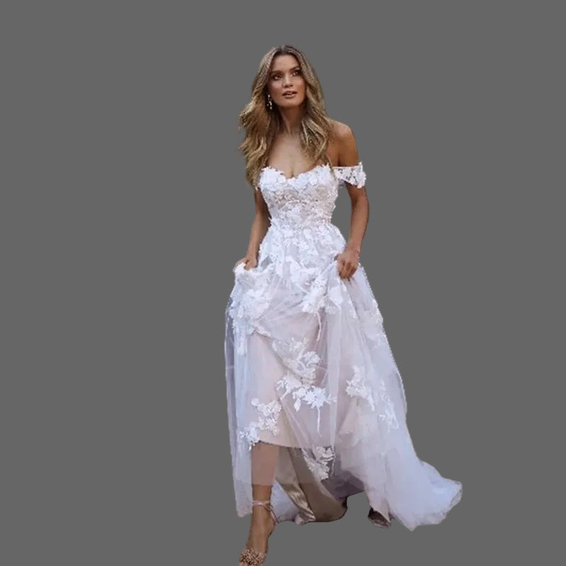 Off-shoulder lace applique bridal gown full skirt princess silhouette 
