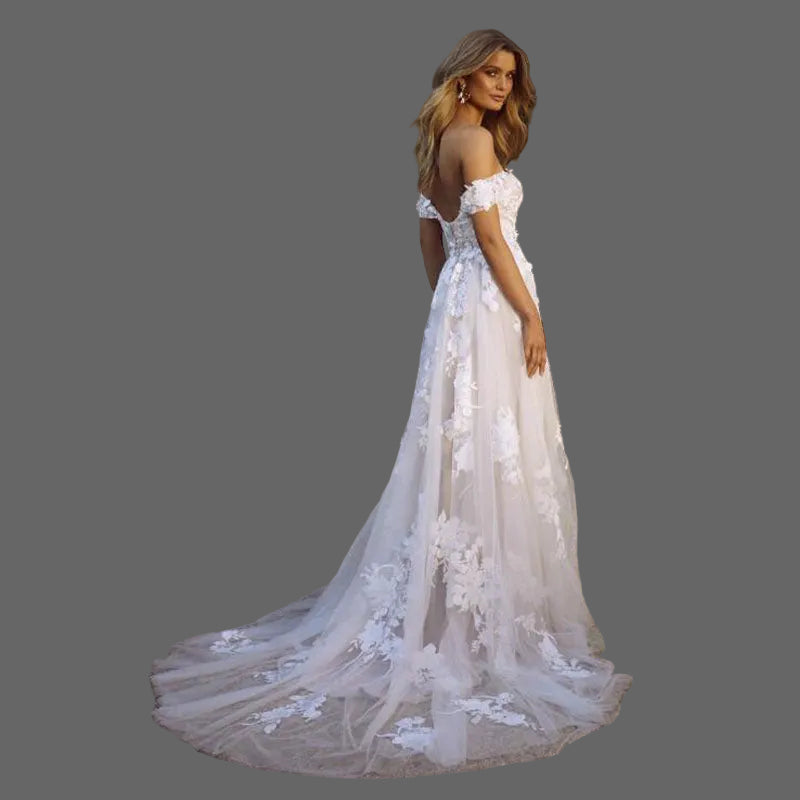 Lace off-shoulder bridal gown back view flowing skirt cathedral train

