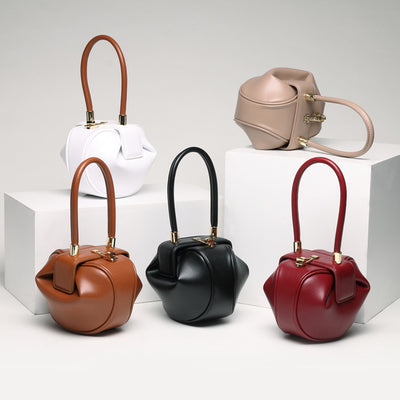 five round leather  handbags in brown, black, red, beige  and white
