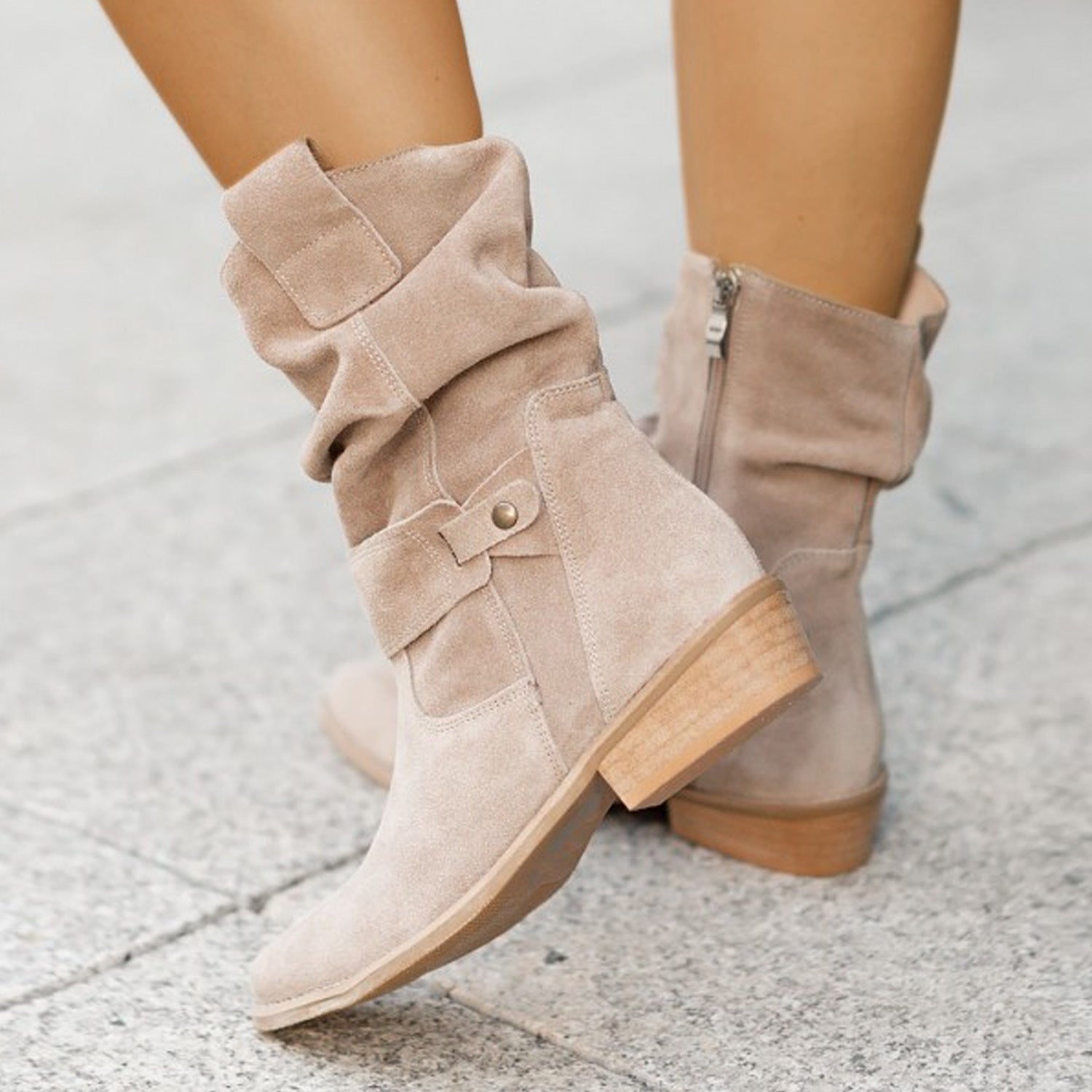 Beige suede western boots with convenient side zipper closure

