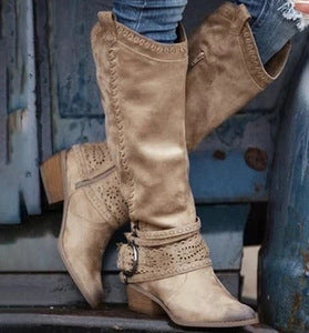 Brown suede boots with decorative details 