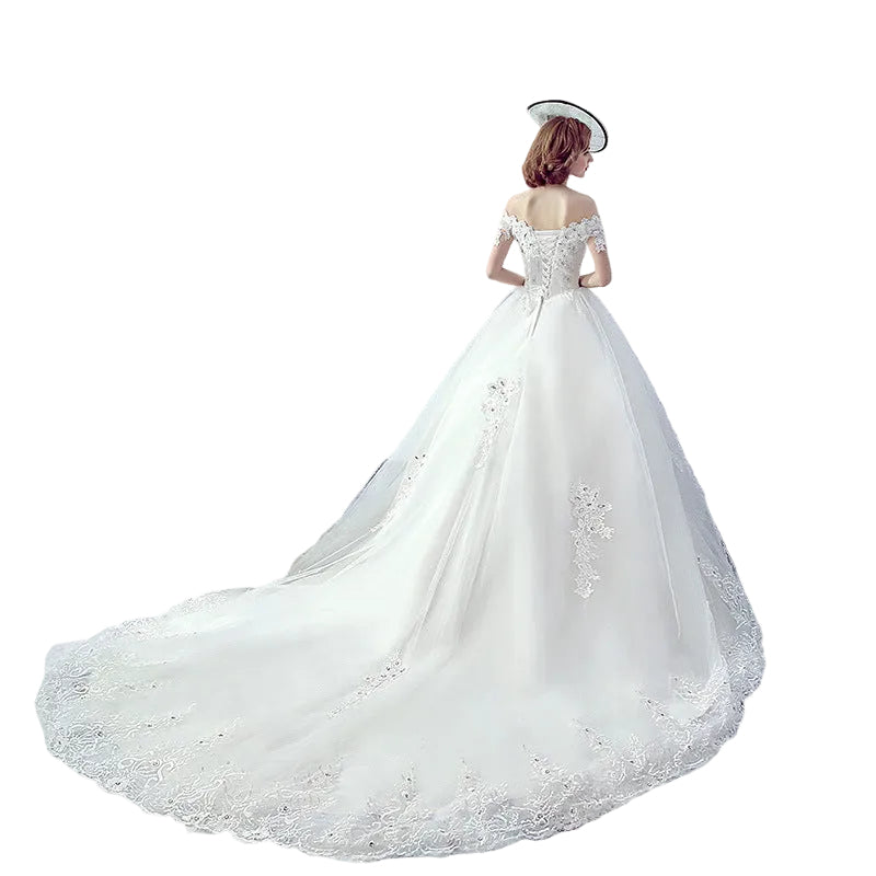 Hepburn-style off-shoulder wedding gown with dramatic train — Uplift Luxe

