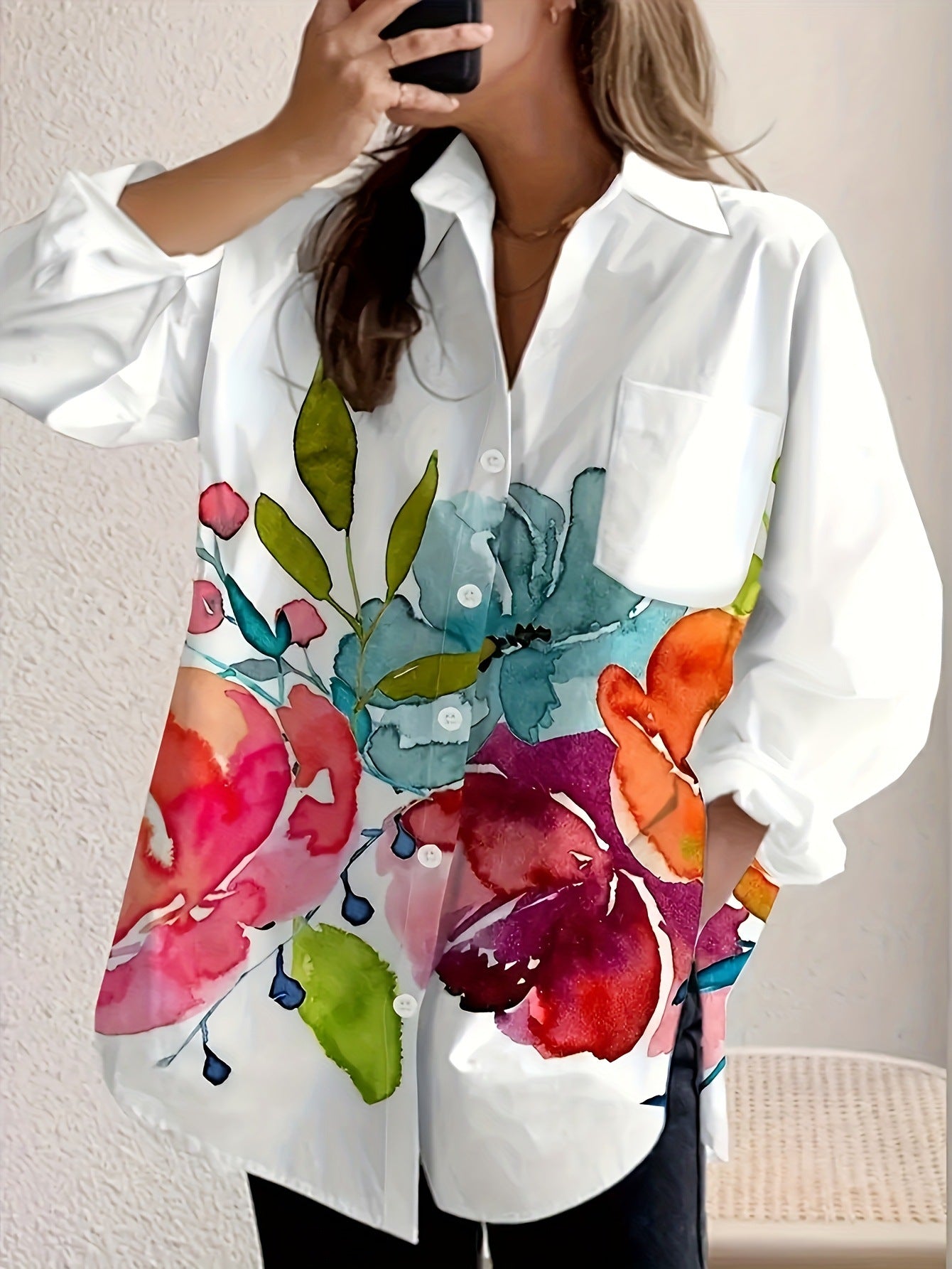 White button-up blouse with watercolor floral print perfect for casual and office wear