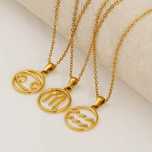 Three gold necklaces with zodiac symbol pendants 