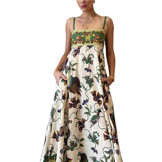 Spaghetti strap swing dress styled with sandals, full length view`