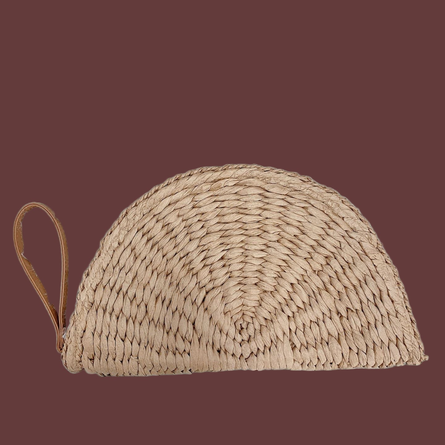 Half Moon Raffia Clutch displayed against a neutral background, emphasizing its fresh and sweet design ideal for casual outings