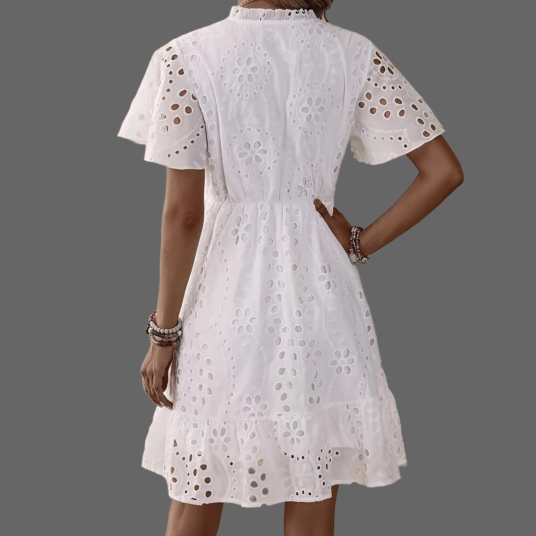 Elegant white lace dress featuring flattering V-neck and A-line silhouette

