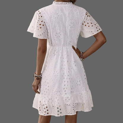 Elegant white lace dress featuring flattering V-neck and A-line silhouette

