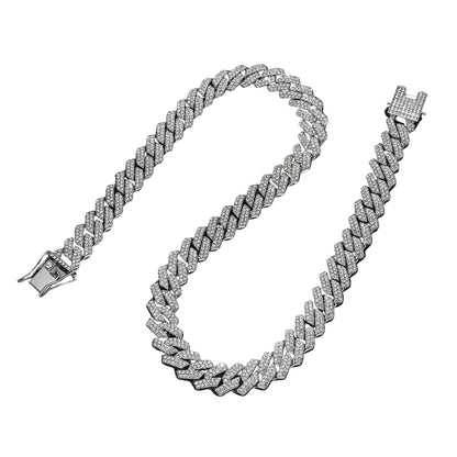 Silver-blue diamond pendant Cuban link necklace – close-up of rhinestone setting and chain detail
