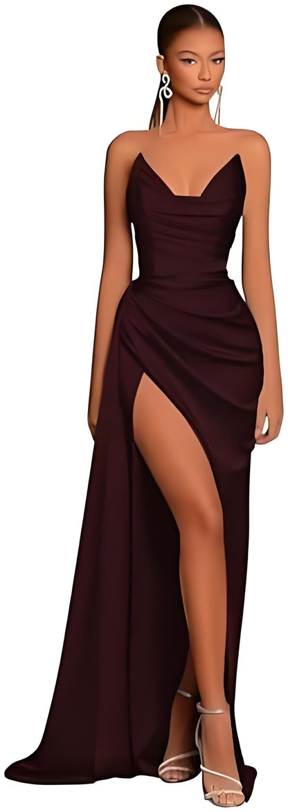 Woman wearing a strapless burgundy evening gown with a high slit  