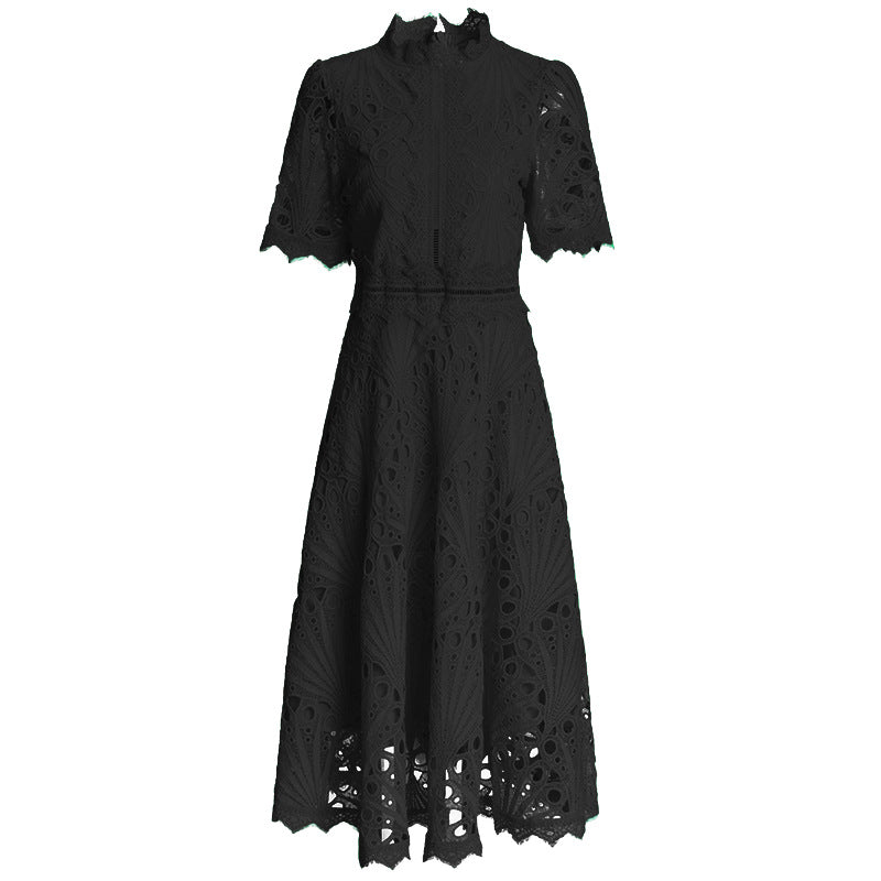 Black retro cinched A-line dress with short sleeves styled for a polished everyday look
