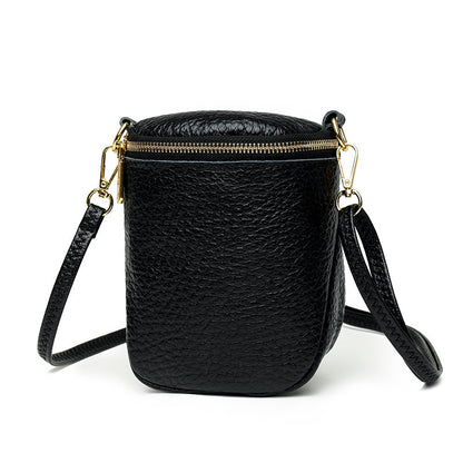 Versatile phone carrier in authentic hide with secure compartment design

