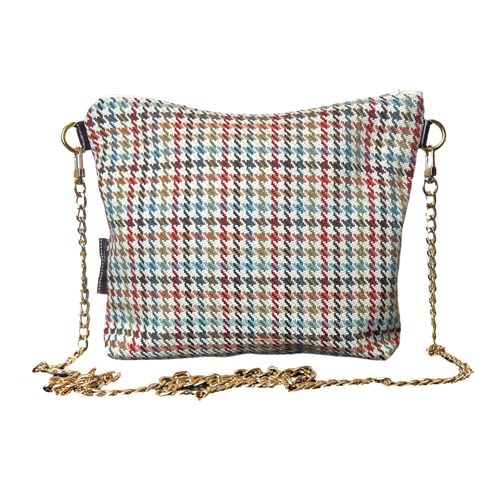 Multicolored houndstooth patterned bag with a gold chain strap on a white background