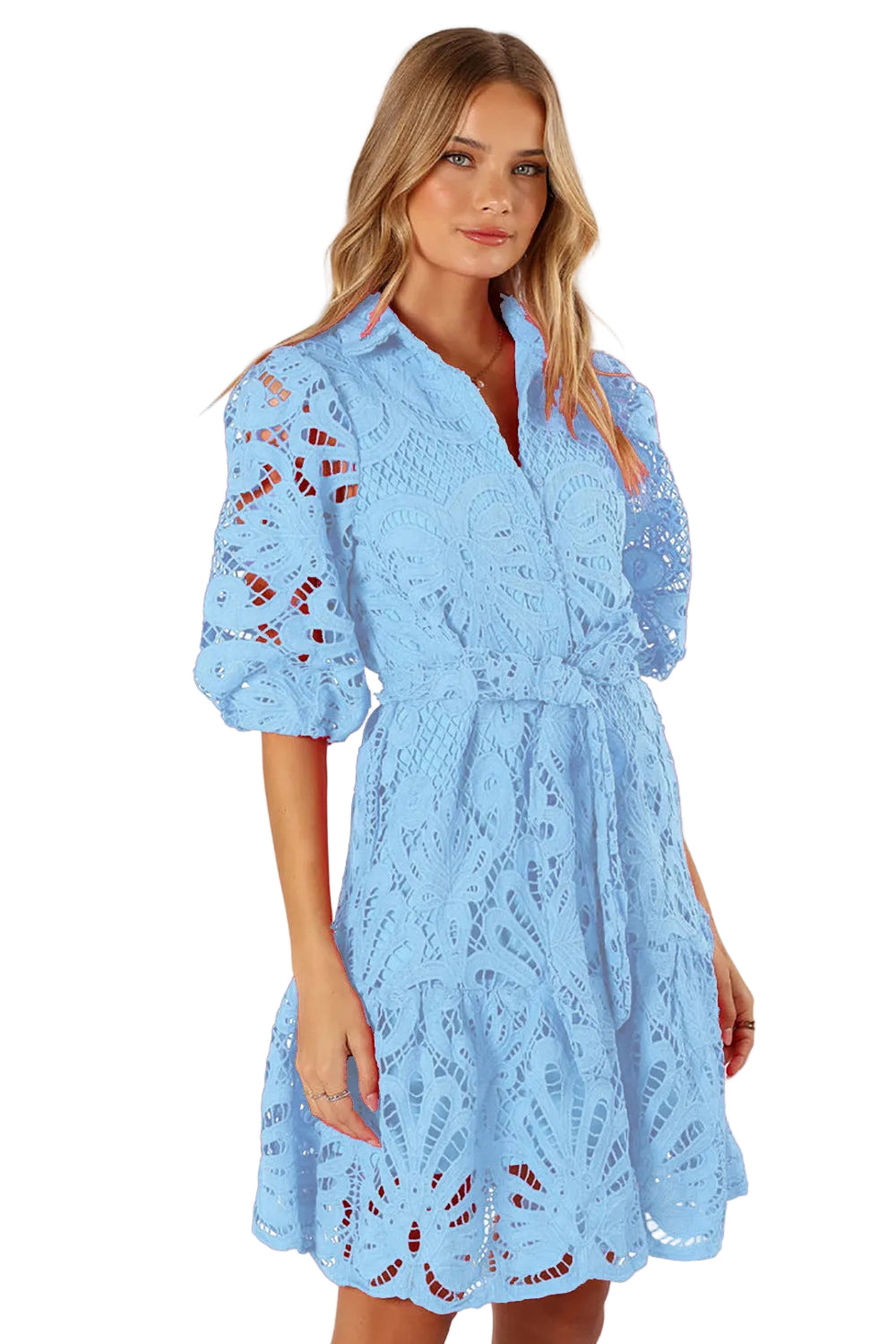 Woman wearing a light blue  mini lace dress 