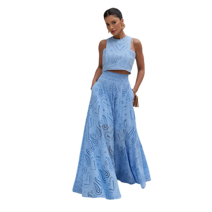 Woman wearing a light blue lace skirt outfit 