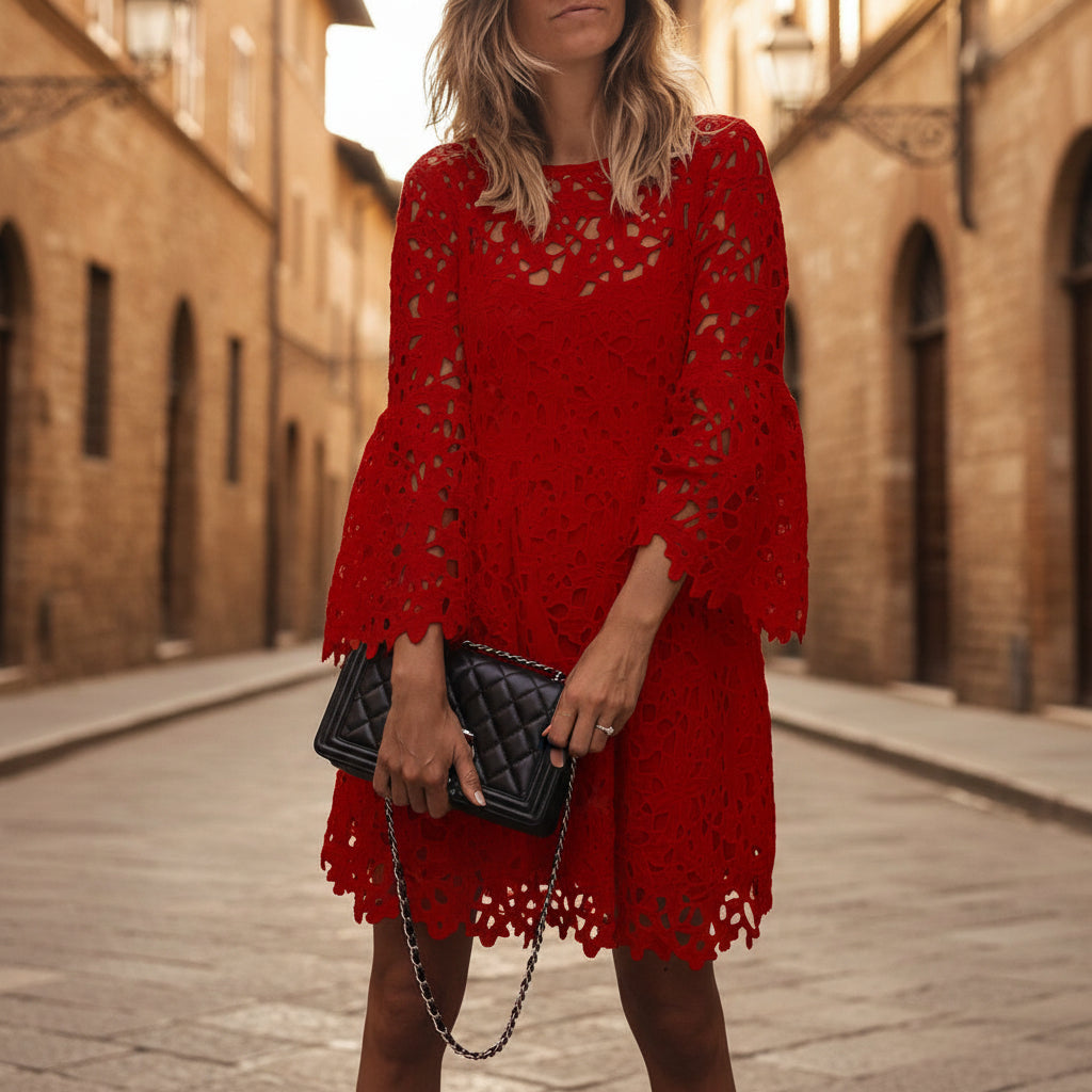 Woman wearing a red lace midi dress 