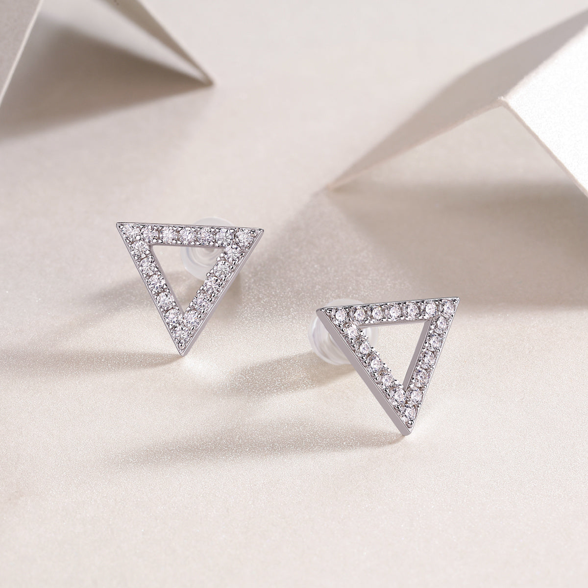 Sterling silver earrings with triangle moissanite stones