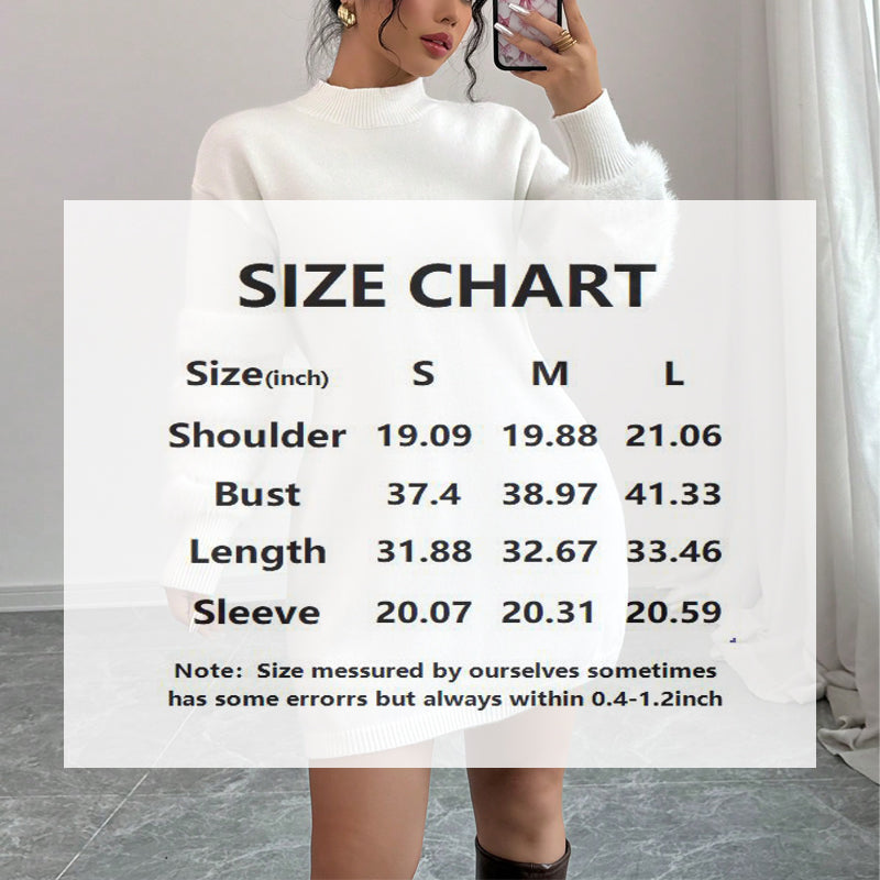 Person holding a size chart for a white sweater with measurements in inches.