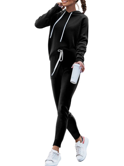 Matching hoodie and trousers sweatsuit in black – front view, relaxed fit casual two-piece set
