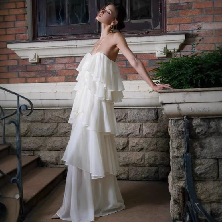 elegant white open back halter dress for wedding day
