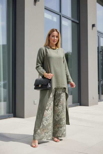 Woman wearing an olive  cotton linen wide-leg pants with deep functional pockets
