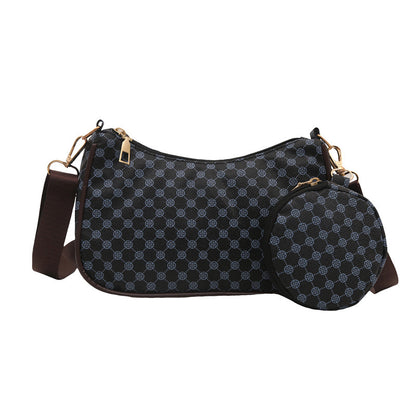 Patterned handbag with matching pouch 