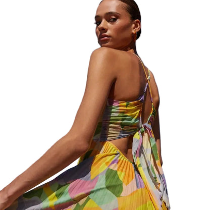 Floral sling dress – close-up of pleated skirt fabric and floral print pattern
