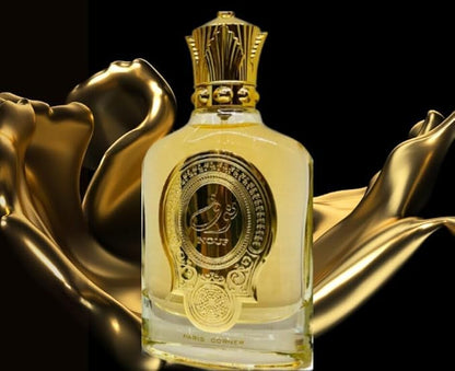 Luxurious perfume bottle with gold accents on a black background