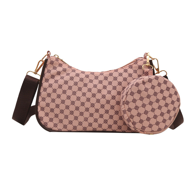 

Pink casual shoulder bag with vintage-inspired design details
