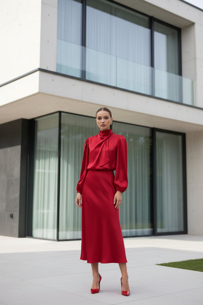 Lantern sleeve satin midi dress – close-up of halterneck neckline and collarbone styling area

