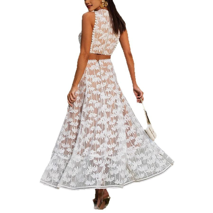 back view of  a woman wearing an elegant white lace skirt set