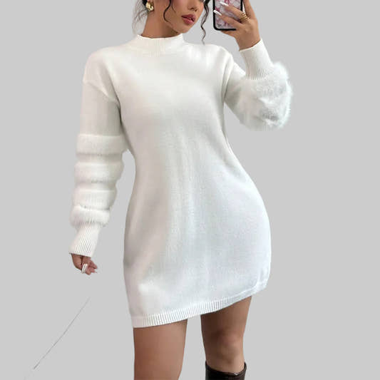 Woman wearing plush mini dress with faux fur trim and long sleeves for winter party

