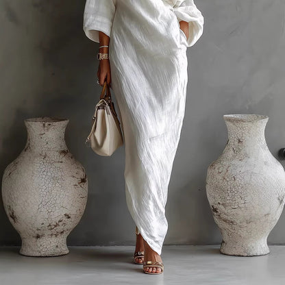 Women's elegant white maxi dress with off-shoulder design perfect for special occasions

